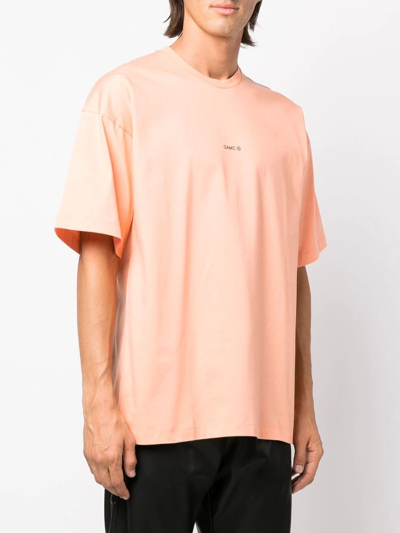 Shop Oamc Graphic-patch Cotton T-shirt In Orange