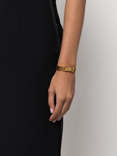 Shop Versace Medusa Greca Cuff Bracelet In Gold