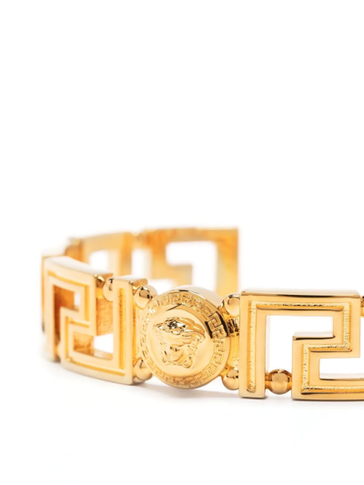 Versace Logo Detailed Bracelet In Metallic