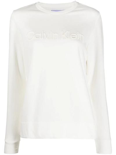 Shop Calvin Klein Embossed-logo Long-sleeve T-shirt In Neutrals