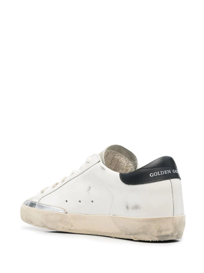 Shop Golden Goose Super-star Distressed Lace-up Sneakers In White