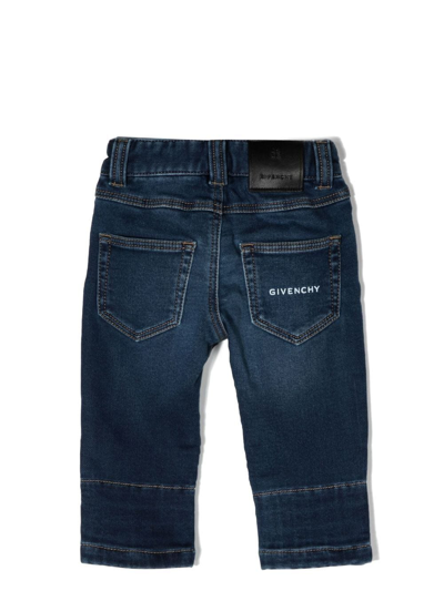 Shop Givenchy Logo-print Slim-cut Jeans In Blue