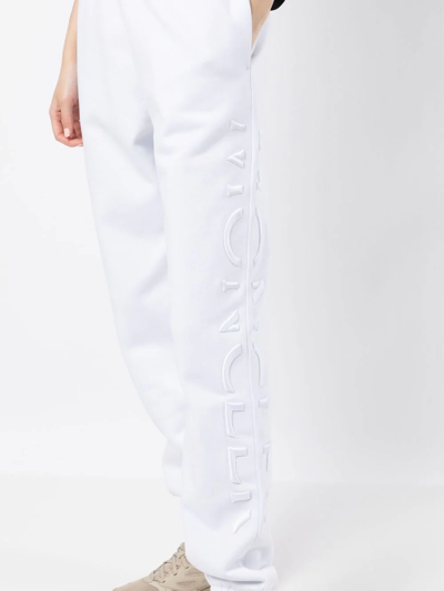 Shop Moncler Embossed-logo Cotton Track Pants In White