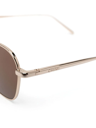 Shop Chimi Lynx Geometric-frame Sunglasses In Gold