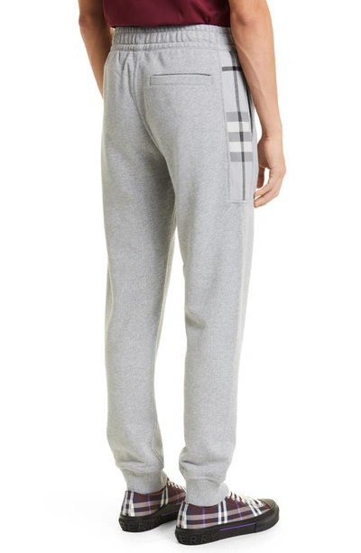 Shop Burberry Stephan Check Joggers In Pale Grey Melange