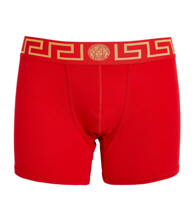 Shop Versace Iconic Greca Long Trunks In Red