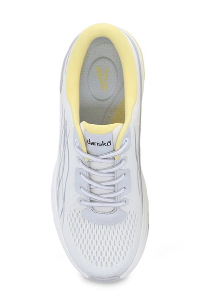 Shop Dansko Pace Sneaker In White/ Yellow Mesh