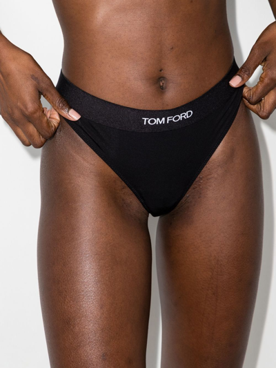Shop Tom Ford Logo-waistband Thong In Black