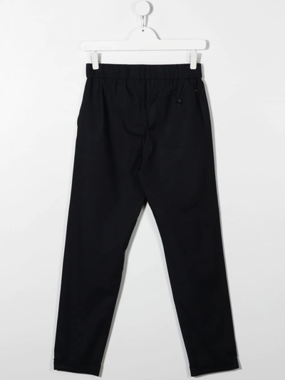 Shop Emporio Armani Turn-up Hem Trousers In Blue