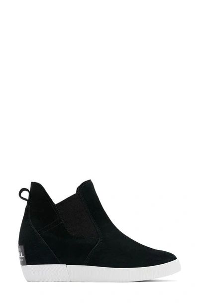 Shop Sorel Out N About Slip-on Wedge Shoe Ii In Black/ White