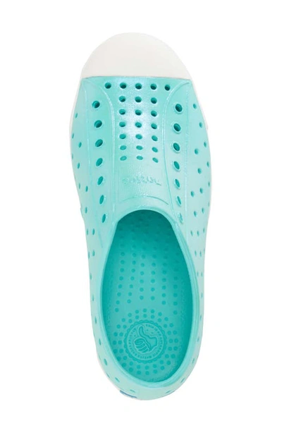 Shop Native Shoes Jefferson Iridescent Slip-on Sneaker In Atlantis Blue/ Shell White