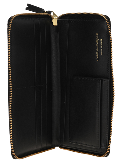 Comme Des Garçons Logo-print Continental Wallet In Black