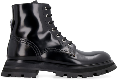 Shop Alexander Mcqueen Wander Leather Combat Boots In Black
