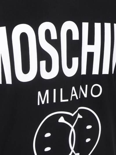 Shop Moschino T-shirt In Black/white