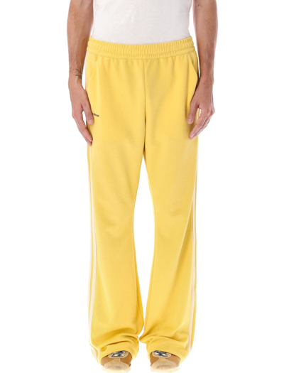 Shop Adidas Originals Track Pants In Yellow Brown