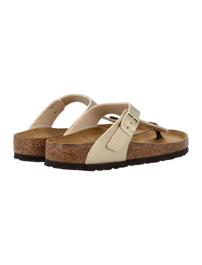 Shop Birkenstock Gizeh Gold Birko-flor