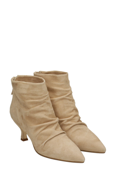 Shop Julie Dee High Heels Ankle Boots In Powder Suede