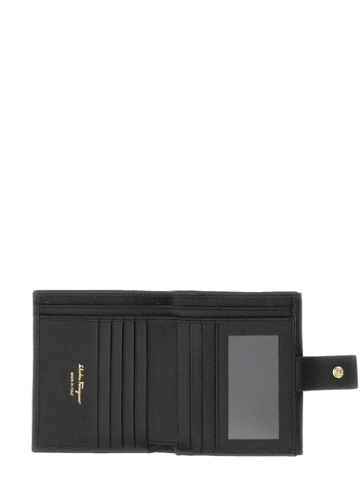 Shop Ferragamo Gancini Wallet In Nero