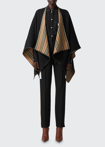 Shop Burberry Reversible Icon Striped To Solid Cape In Black