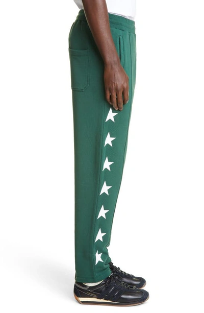 Shop Golden Goose Star Print Cotton Joggers In Bright Green/ White