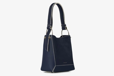 Shop Strathberry Lana Midi Bucket Bag In ネイビー / 白