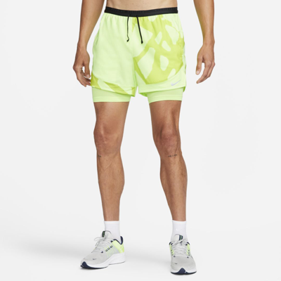 Shop Nike Men's Dri-fit Stride Run Division 2-in-1 Running Shorts In Ghost Green
