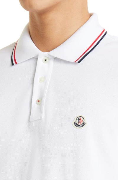 Shop Moncler Tipped Piqué Polo In White