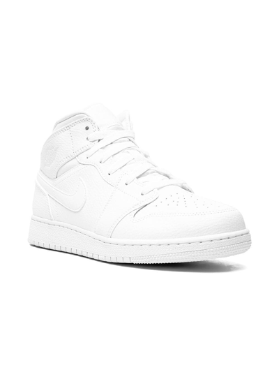 Shop Jordan Air  1 Mid Sneakers In White