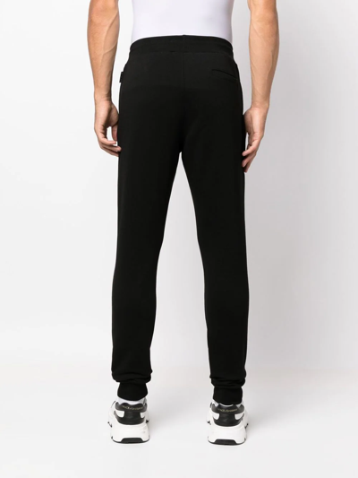 Shop Philipp Plein Hexagon Tapered Track Pants In Black