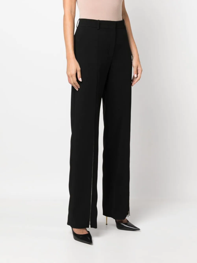 Shop Nina Ricci Zip-detail Wide-leg Trousers In Black