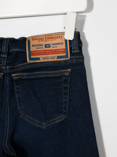 Shop Diesel Mid-rise Bootcut Jeans In Blue