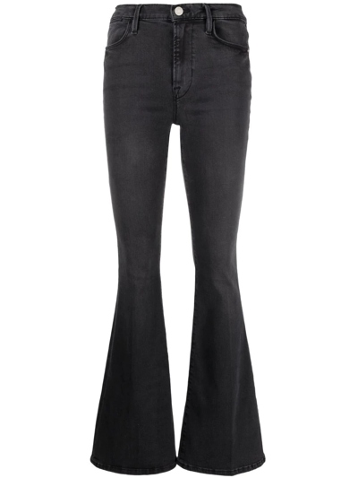 Shop Frame Le High Mid-rise Flared Jeans In Black