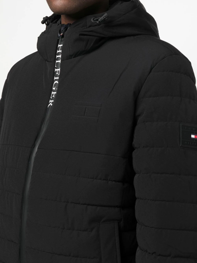 Shop Tommy Hilfiger Padded Hooded Jacket In Schwarz
