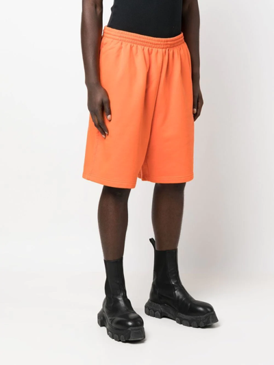 Shop Balenciaga Logo-embroidered Track Shorts In Orange