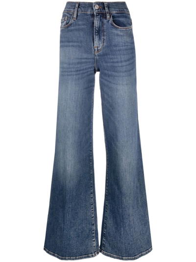 Shop Frame High-rise Flared Jeans In Blau