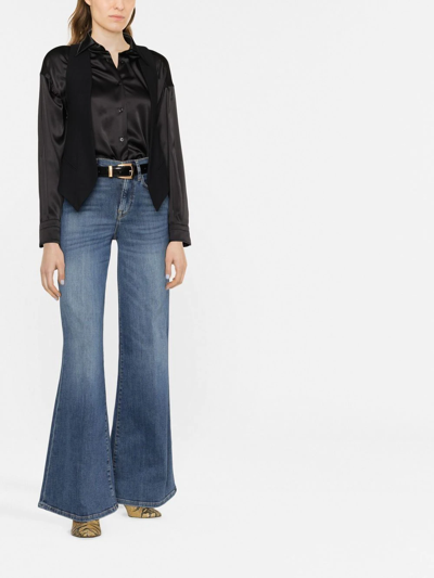 Shop Frame High-rise Flared Jeans In Blau