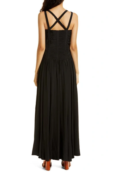 Shop Ulla Johnson Anya Shirred Strappy Silk Gown In Noir