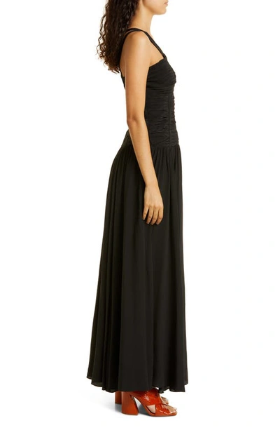 Shop Ulla Johnson Anya Shirred Strappy Silk Gown In Noir