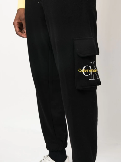 Shop Calvin Klein Jeans Est.1978 Embroidered-logo Track Pants In Schwarz