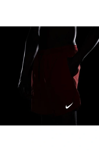 Shop Nike Dri-fit Stride 2-in-1 Running Shorts In University Red/ Black/ Black