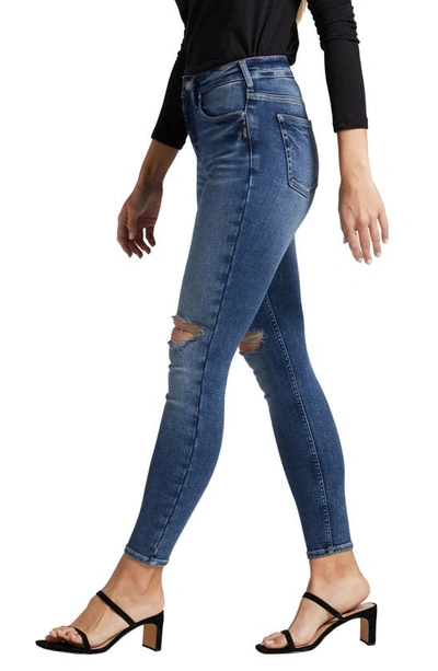 Shop Silver Jeans Co. Infinite Fit Ripped High Waist Skinny Jeans In Indigo