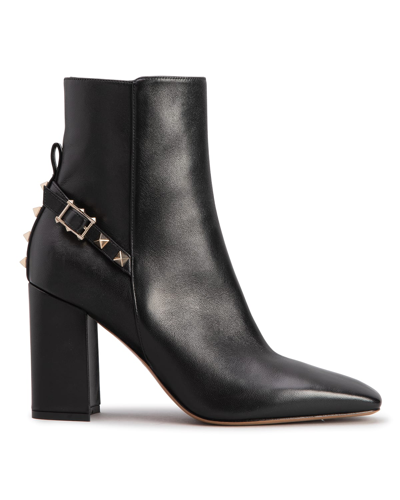 Shop Valentino Rockstud Leather Buckle Ankle Booties In 0no-nero