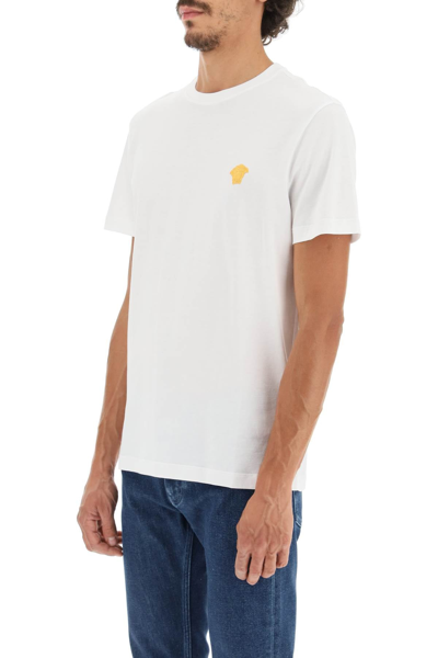 Shop Versace Taylor Fit T-shirt With Medusa Embroidery In White
