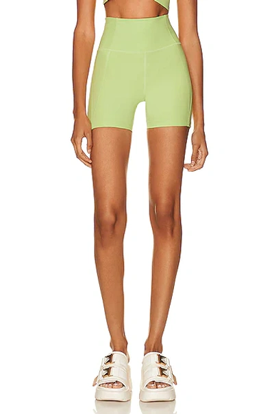 Shop Girlfriend Collective High-rise Running Short In Key Lime