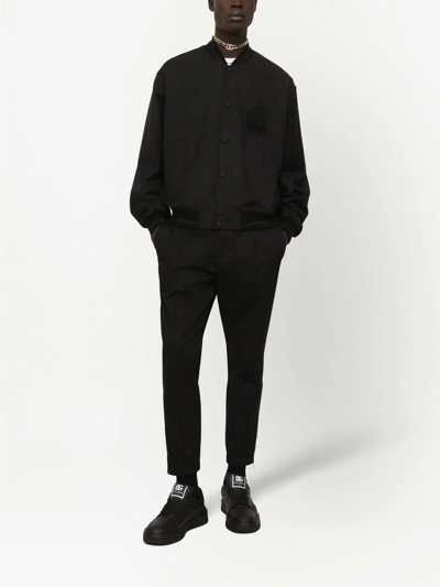Dolce & Gabbana Solid Color Bomber Jacket With Embroidered Logo In Black