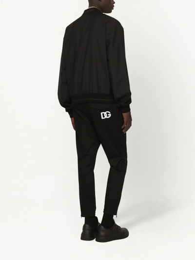 Dolce & Gabbana Solid Color Bomber Jacket With Embroidered Logo In Black