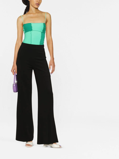 Shop Pinko High-waisted Flared Trousers In Schwarz