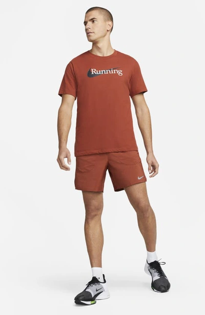 Shop Nike Flex Stride Performance Athletic Shorts In Rugged Orange/ Black