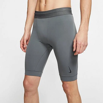 Shop Nike Men's Yoga Dri-fit Shorts In Iron Grey/black