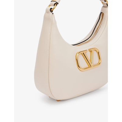 VALENTINO GARAVANI: Stud Sign leather hobo bag - Ivory  Valentino Garavani  shoulder bag 1W2B0K69EIM online at